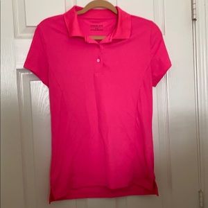 Pink golf polo